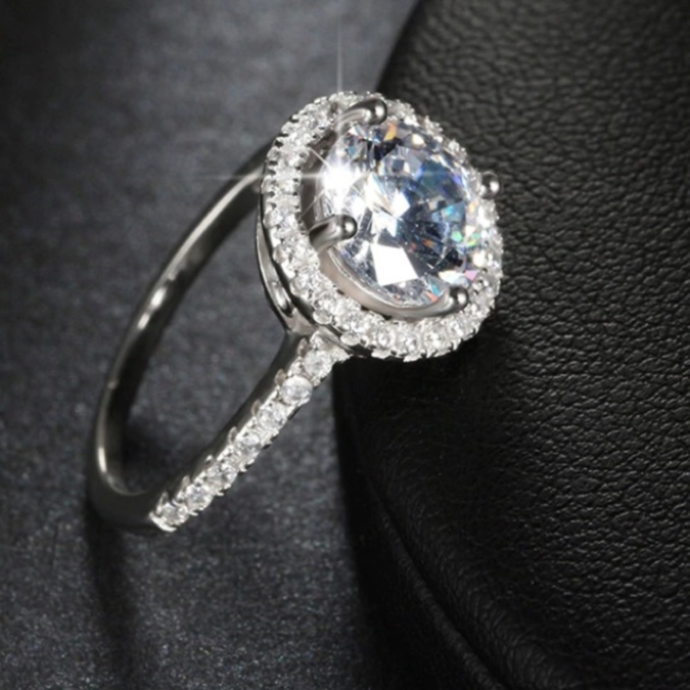 Cubic zirconia engagement style halo ring